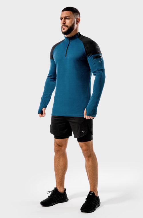 Íþróttafatnaður frá Squat Wolf í vefverslun Ludus.is. Æfingafatöt - Evolve Running Top eru flottir hlaupabolir fyrir herra. Þessi langermabolur er hannaður sérstaklega með hlaup í huga. #litur-color_teal