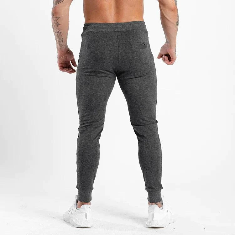 Joggingbuxur - herra - karlar - íþróttaföt - íþróttafatnaður - æfingaföt - æfingafatnaður - ræktarföt - ræktarfatnaður - world - class - SQUATWOLF - íþróttavöruverslun - Ludus.is - gráar - grey