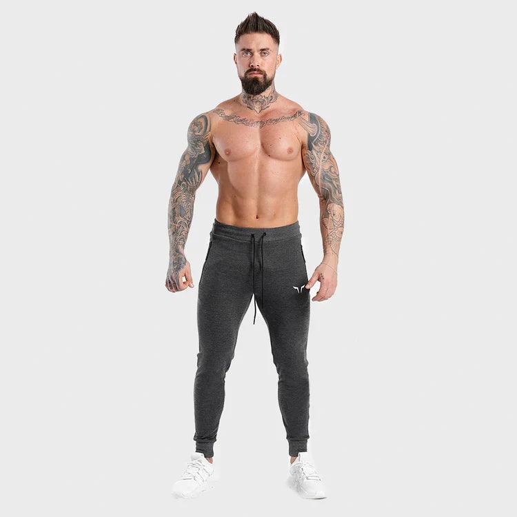 Joggingbuxur - herra - karlar - íþróttaföt - íþróttafatnaður - æfingaföt - æfingafatnaður - ræktarföt - ræktarfatnaður - world - class - SQUATWOLF - íþróttavöruverslun - Ludus.is - gráar - grey