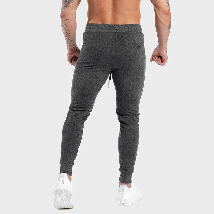 Joggingbuxur - herra - karlar - íþróttaföt - íþróttafatnaður - æfingaföt - æfingafatnaður - ræktarföt - ræktarfatnaður - world - class - SQUATWOLF - íþróttavöruverslun - Ludus.is - gráar - grey