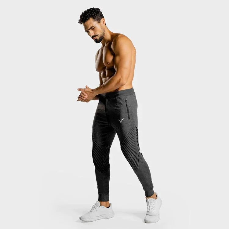 Joggingbuxur - íþróttaföt - herra - karlar - íþróttafatnaður - æfingaföt - æfingafatnaður - ræktarföt - ræktarfatnaður - world - class - gráar - SQUATWOLF - íþróttavöruverslun - Ludus.is