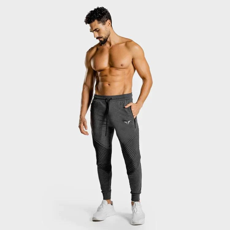 Joggingbuxur - íþróttaföt - herra - karlar - íþróttafatnaður - æfingaföt - æfingafatnaður - ræktarföt - ræktarfatnaður - world - class - gráar - SQUATWOLF - íþróttavöruverslun - Ludus.is