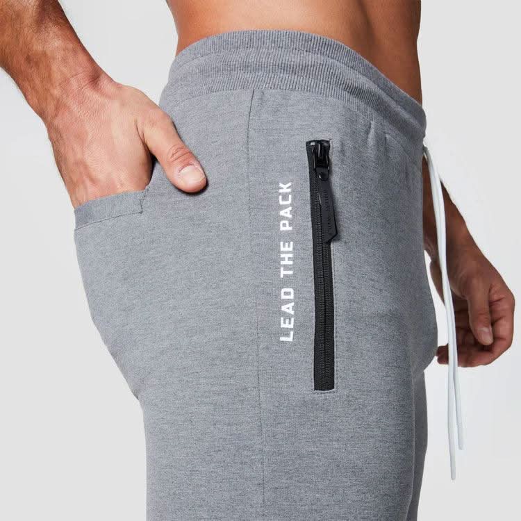 Joggingbuxur - karlar - herra - íþróttaföt - íþróttafatnaður - æfingaföt - æfingafatnaður - ræktarföt - ræktarfatnaður - world - class - SQUATWOLF - íþróttavöruverslun - Ludus.is - gráar - grey