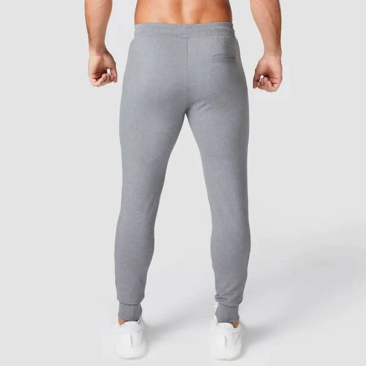 Joggingbuxur - karlar - herra - íþróttaföt - íþróttafatnaður - æfingaföt - æfingafatnaður - ræktarföt - ræktarfatnaður - world - class - SQUATWOLF - íþróttavöruverslun - Ludus.is - gráar - grey