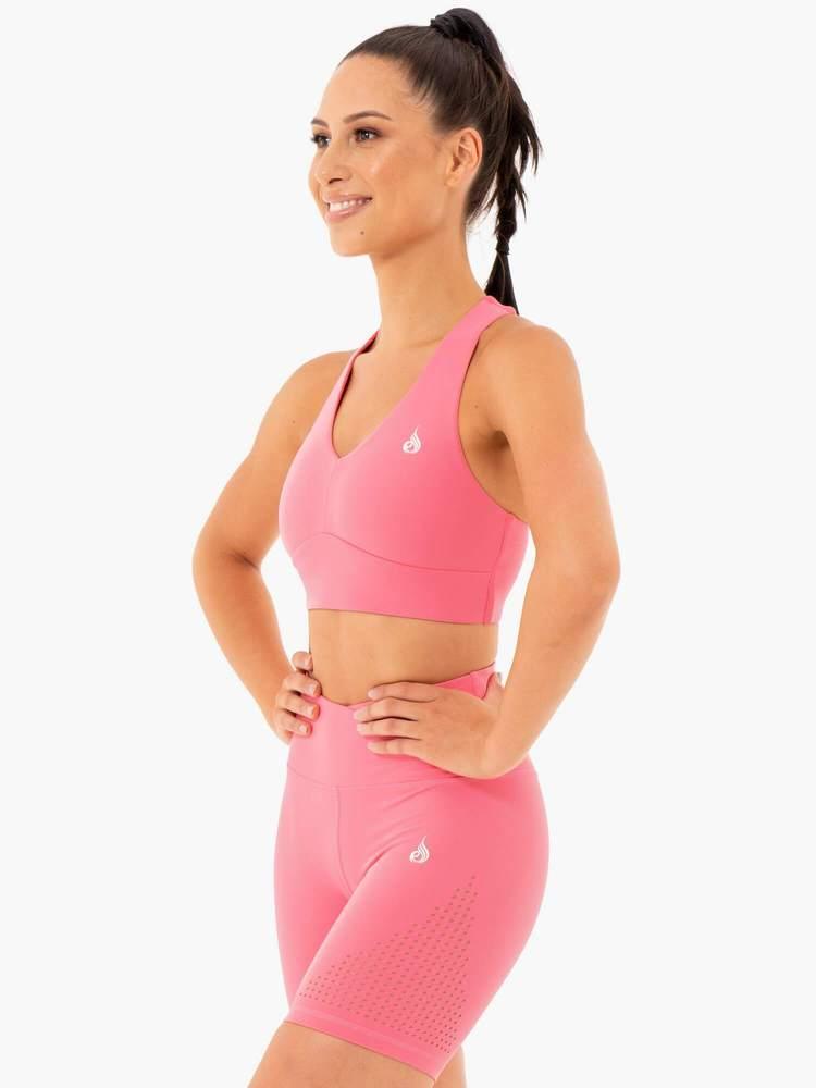Impact Æfingatoppur er fallegur æfingatoppur frá Ryderwear sem kemur í nokkrum mismunandi litum. Hægt að para með Impact Leggings. Þessi æfingatoppur hentar vel fyrir lyftingar, í ræktina, jóga, pilates eða cardio æfingar.#litur-color_pink