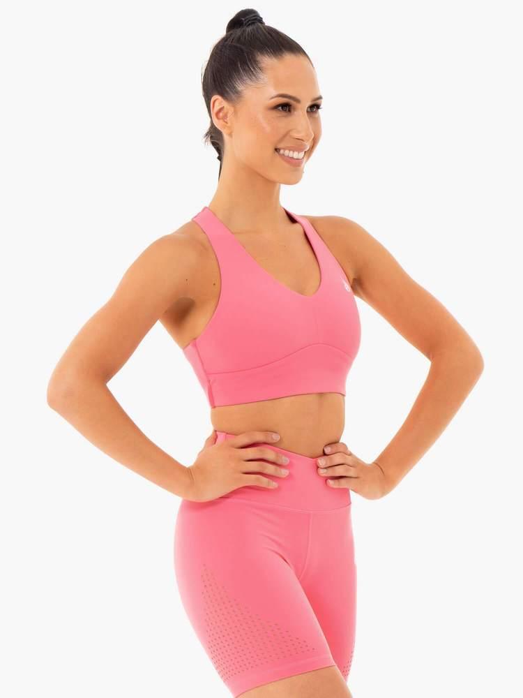 Impact Æfingatoppur er fallegur æfingatoppur frá Ryderwear sem kemur í nokkrum mismunandi litum. Hægt að para með Impact Leggings. Þessi æfingatoppur hentar vel fyrir lyftingar, í ræktina, jóga, pilates eða cardio æfingar.#litur-color_pink