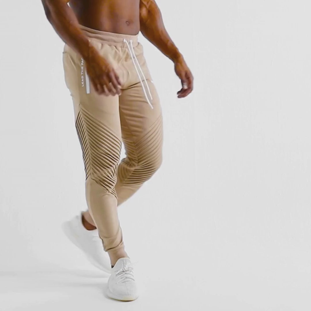 Joggingbuxur - íþróttaföt - herra - karlar - íþróttafatnaður - æfingaföt - æfingafatnaður - ræktarföt - ræktarfatnaður - world - class - ljósbrúnar - SQUATWOLF - Ludus.is