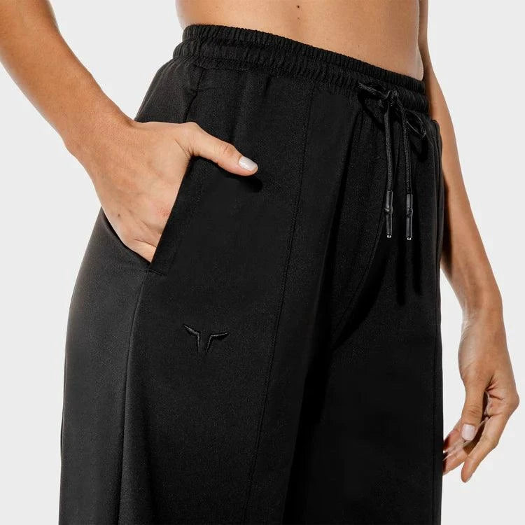 Joggingbuxur - konur - íþróttaföt - íþróttafatnaður - æfingaföt - æfingafatnaður - ræktarföt - Fitness - Afþreyingarföt - Síðbuxur - dömur- Squatwolf - Afþreyingarfatnaður - Fitness - víðar - joggingbuxur - Ludus.is #litur-color_black
