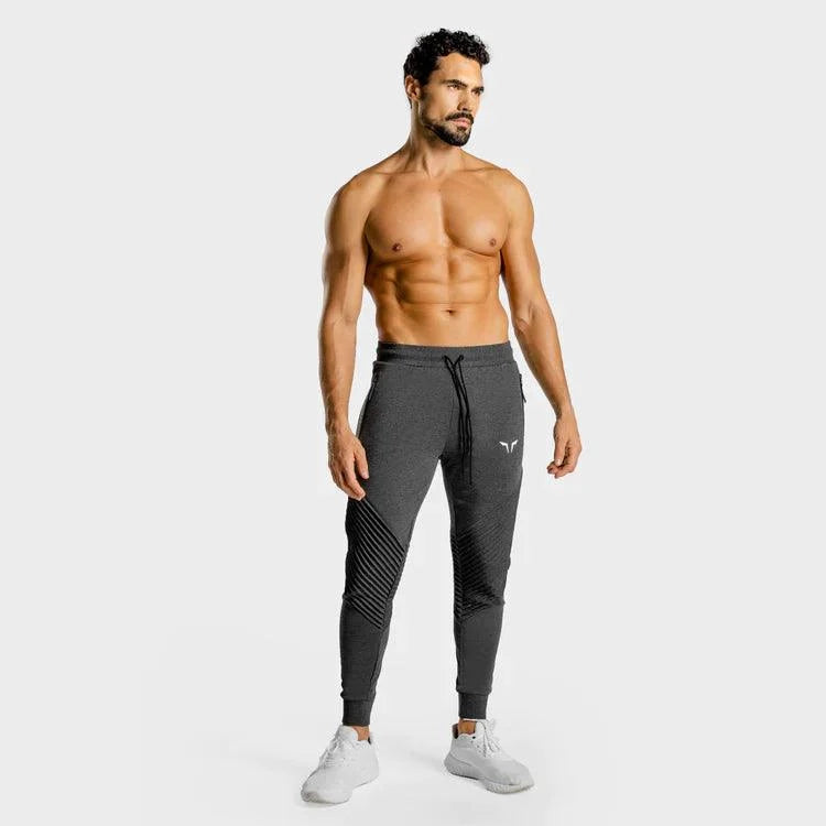 Joggingbuxur - íþróttaföt - herra - karlar - íþróttafatnaður - æfingaföt - æfingafatnaður - ræktarföt - ræktarfatnaður - world - class - gráar - SQUATWOLF - íþróttavöruverslun - Ludus.is