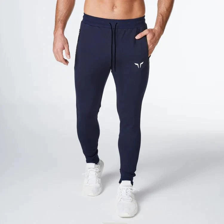 Joggingbuxur - herra - karlar - íþróttaföt - íþróttafatnaður - æfingaföt - æfingafatnaður - ræktarföt - ræktarfatnaður - world - class - SQUATWOLF - íþróttavöruverslun - Ludus.is - bláar - navy