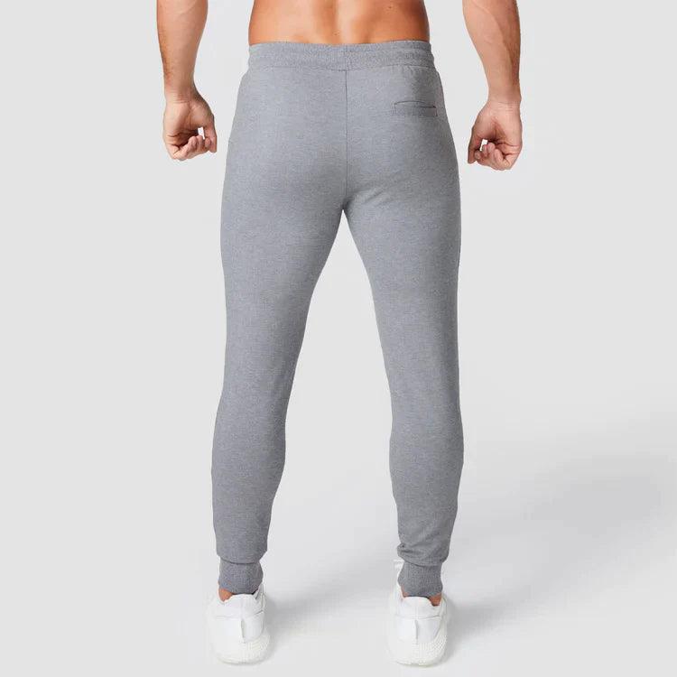 Joggingbuxur - karlar - herra - íþróttaföt - íþróttafatnaður - æfingaföt - æfingafatnaður - ræktarföt - ræktarfatnaður - world - class - SQUATWOLF - íþróttavöruverslun - Ludus.is - gráar - grey