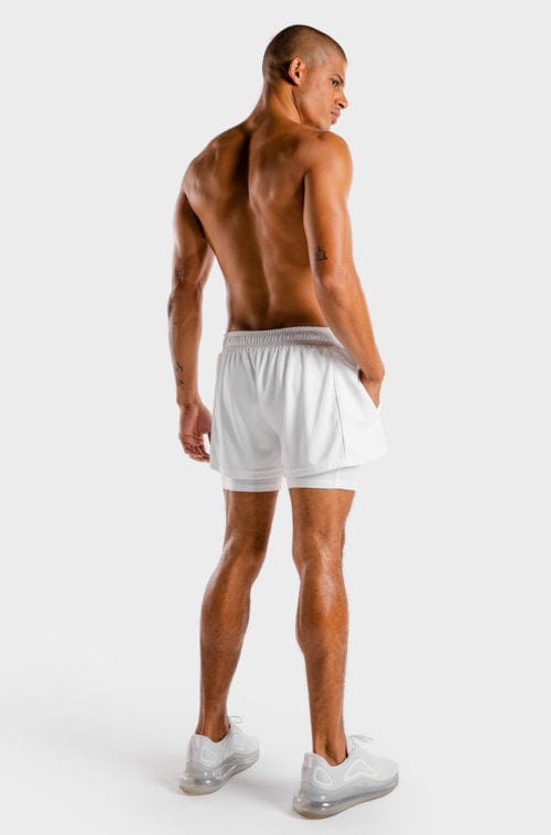 Íþróttaföt frá Squat Wolf í vefverslun Ludus.is. Æfingafatnaður - Hybrid 2 in 1 shorts eru flottar stuttbuxur fyrir herra. Þessar hvítu stuttbuxur henta jafnt í Crossfit sem hlaup. #litur-color_white