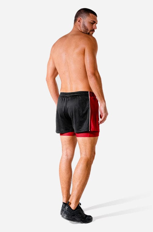 Íþróttaföt frá Squat Wolf í vefverslun Ludus.is. Æfingafatnaður - Hybrid 2 in 1 shorts eru flottar stuttbuxur fyrir herra. Þessar svörtu og rauðu stuttbuxur henta jafnt í Crossfit sem hlaup. #litur-color_onyx-red