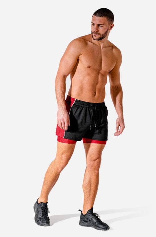 Íþróttaföt frá Squat Wolf í vefverslun Ludus.is. Æfingafatnaður - Hybrid 2 in 1 shorts eru flottar stuttbuxur fyrir herra. Þessar svörtu og rauðu stuttbuxur henta jafnt í Crossfit sem hlaup. #litur-color_onyx-red