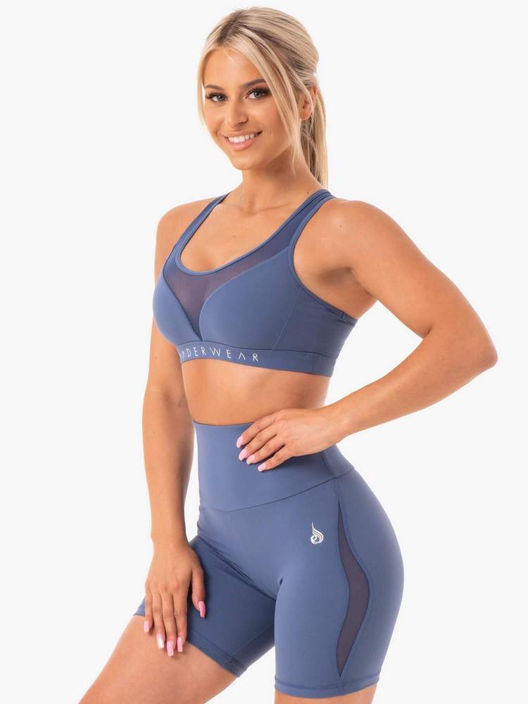 Hype Mesh Æfingatoppur er fallegur æfingatoppur frá Ryderwear sem kemur í nokkrum mismunandi litum. Hægt að para með Hype High Waisted Mesh Leggings. Þessi æfingatoppur hentar vel fyrir lyftingar, í ræktina, jóga, pilates eða cardio æfingar#litur-color_steel-blue