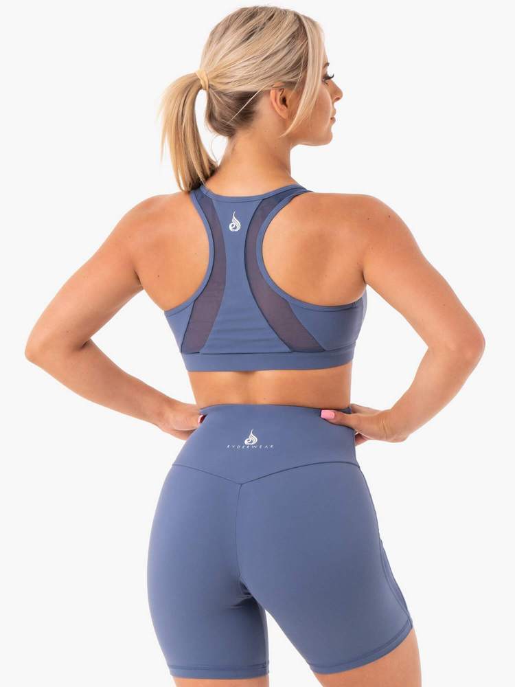 Hype Mesh Æfingatoppur er fallegur æfingatoppur frá Ryderwear sem kemur í nokkrum mismunandi litum. Hægt að para með Hype High Waisted Mesh Leggings. Þessi æfingatoppur hentar vel fyrir lyftingar, í ræktina, jóga, pilates eða cardio æfingar#litur-color_steel-blue