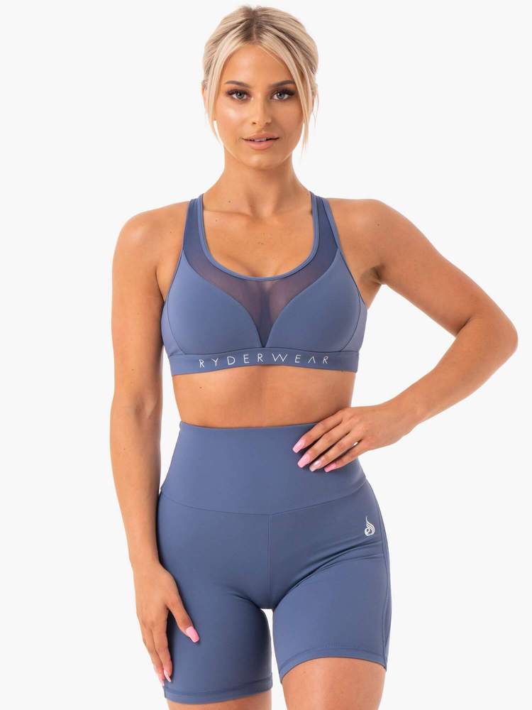 Hype Mesh Æfingatoppur er fallegur æfingatoppur frá Ryderwear sem kemur í nokkrum mismunandi litum. Hægt að para með Hype High Waisted Mesh Leggings. Þessi æfingatoppur hentar vel fyrir lyftingar, í ræktina, jóga, pilates eða cardio æfingar#litur-color_steel-blue