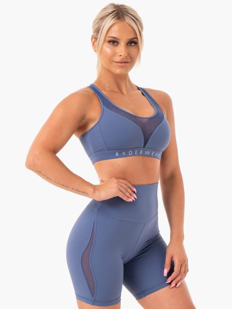 Hype Mesh Æfingatoppur er fallegur æfingatoppur frá Ryderwear sem kemur í nokkrum mismunandi litum. Hægt að para með Hype High Waisted Mesh Leggings. Þessi æfingatoppur hentar vel fyrir lyftingar, í ræktina, jóga, pilates eða cardio æfingar#litur-color_steel-blue