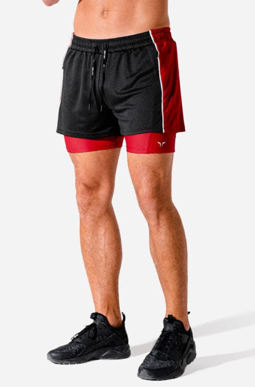 Íþróttaföt frá Squat Wolf í vefverslun Ludus.is. Æfingafatnaður - Hybrid 2 in 1 shorts eru flottar stuttbuxur fyrir herra. Þessar svörtu og rauðu stuttbuxur henta jafnt í Crossfit sem hlaup. #litur-color_onyx-red